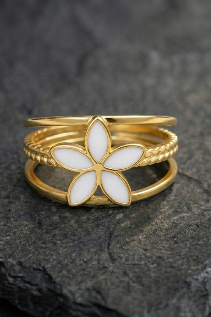 White flower row ring