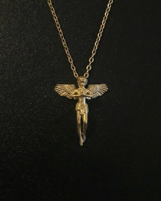 Gold praying angel pendant shaped into a standing winged angel with hands clasped in prayer, close detail