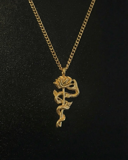 Gold snake rose pendant with a serpent coiled around a long-stemmed rose, close detail
